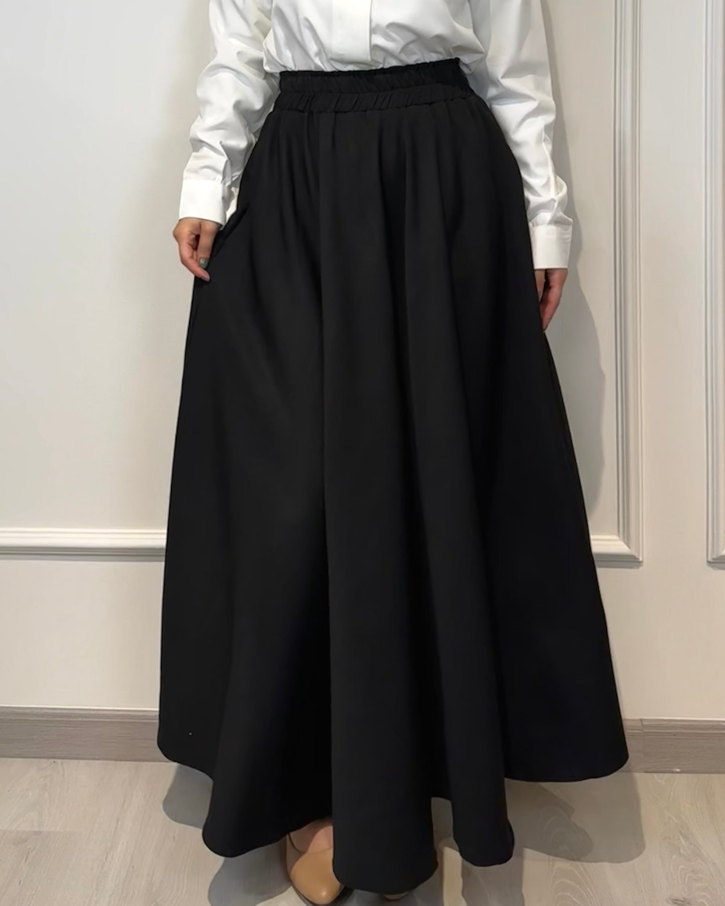 Crepe full cloche maxi skirt in black with a flowing fit, length 100 cm