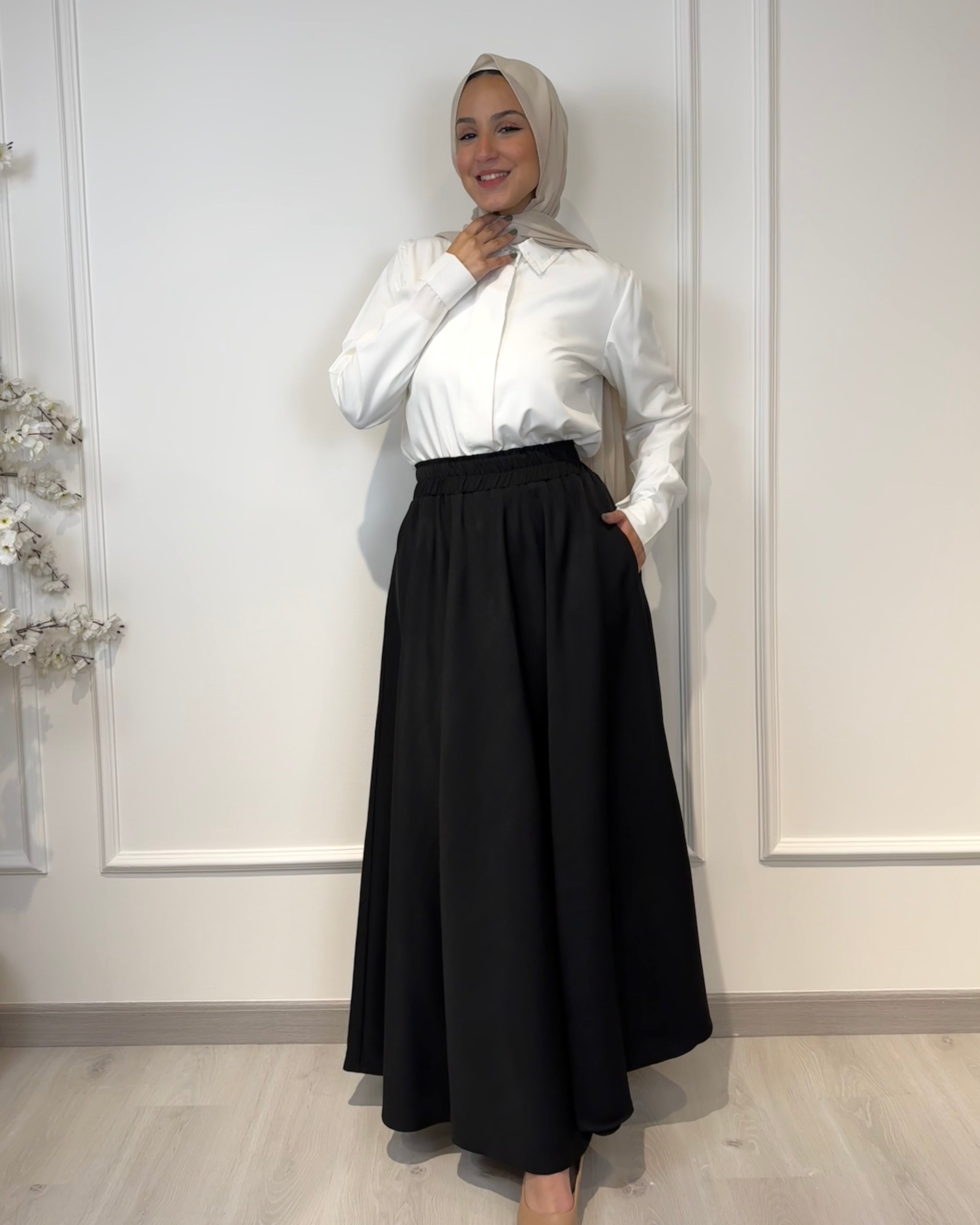 Crepe full cloche maxi skirt in black with a flowing fit, length 100 cm