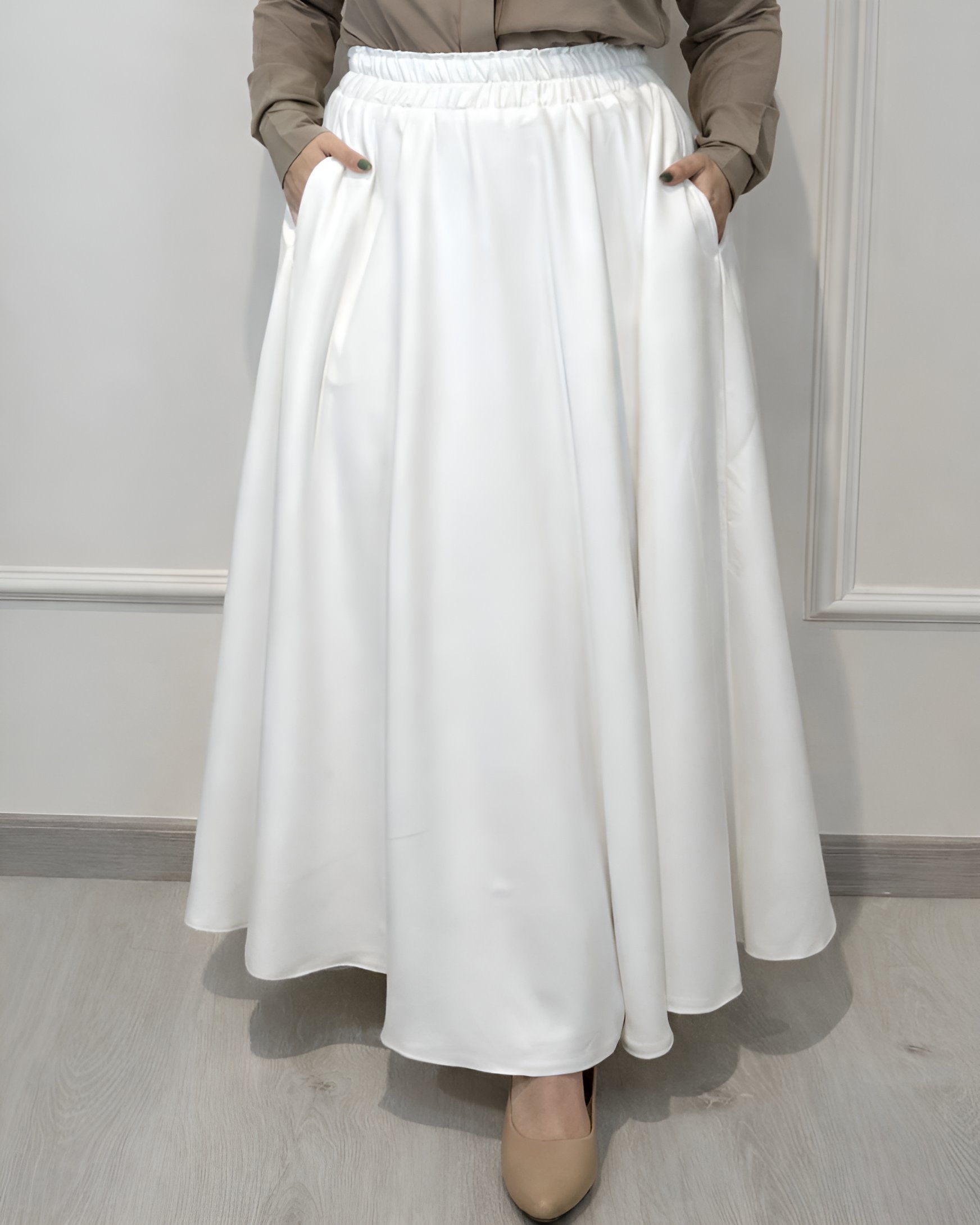 Crepe full cloche maxi skirt in off-white with a flowing fit, length 100 cm. Plus Size
