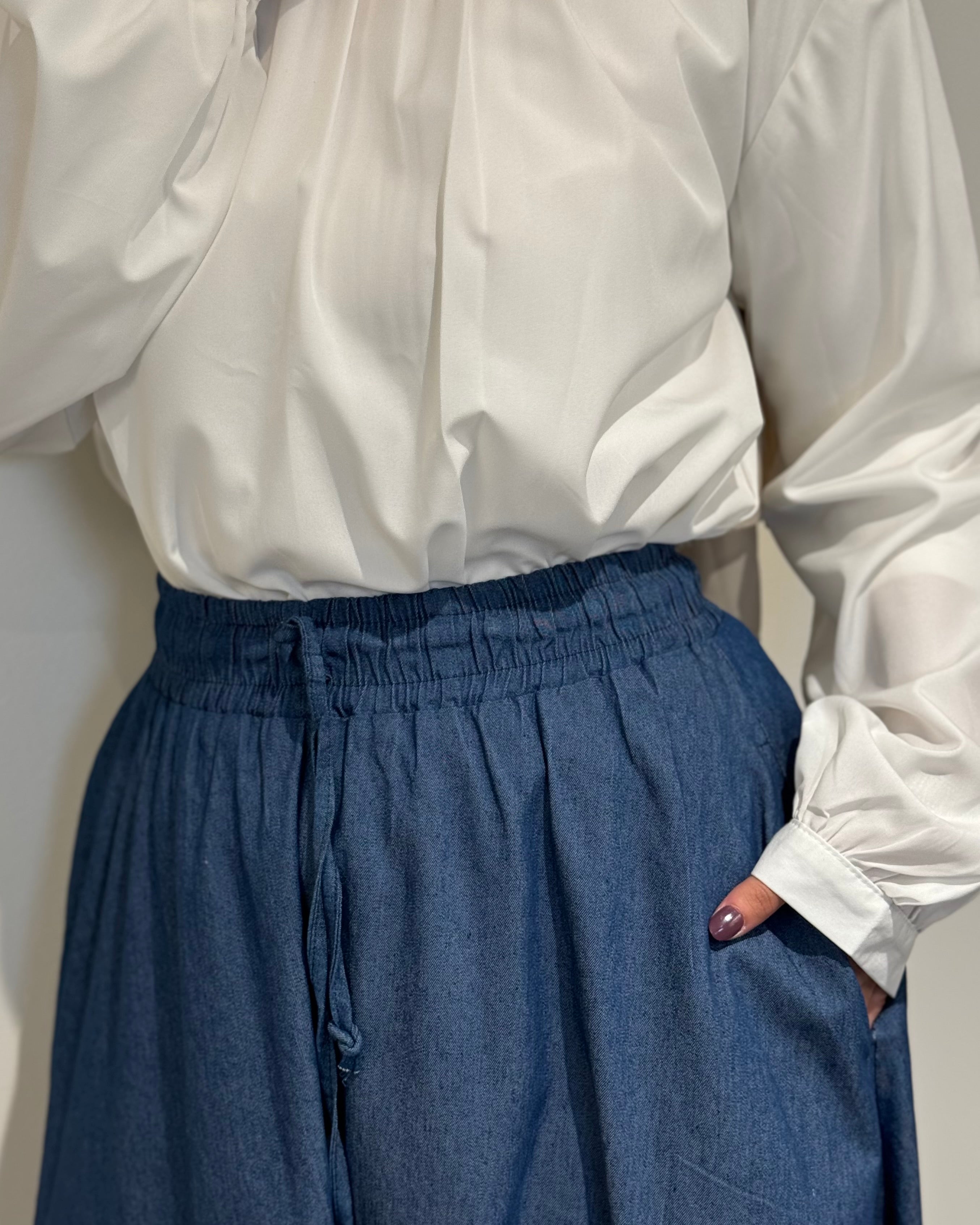 Denim full cloche skirt with high waist and wide flowy cut, modest long skirt