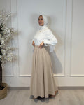 Beige full cloche suede skirt with soft texture and elegant modest style