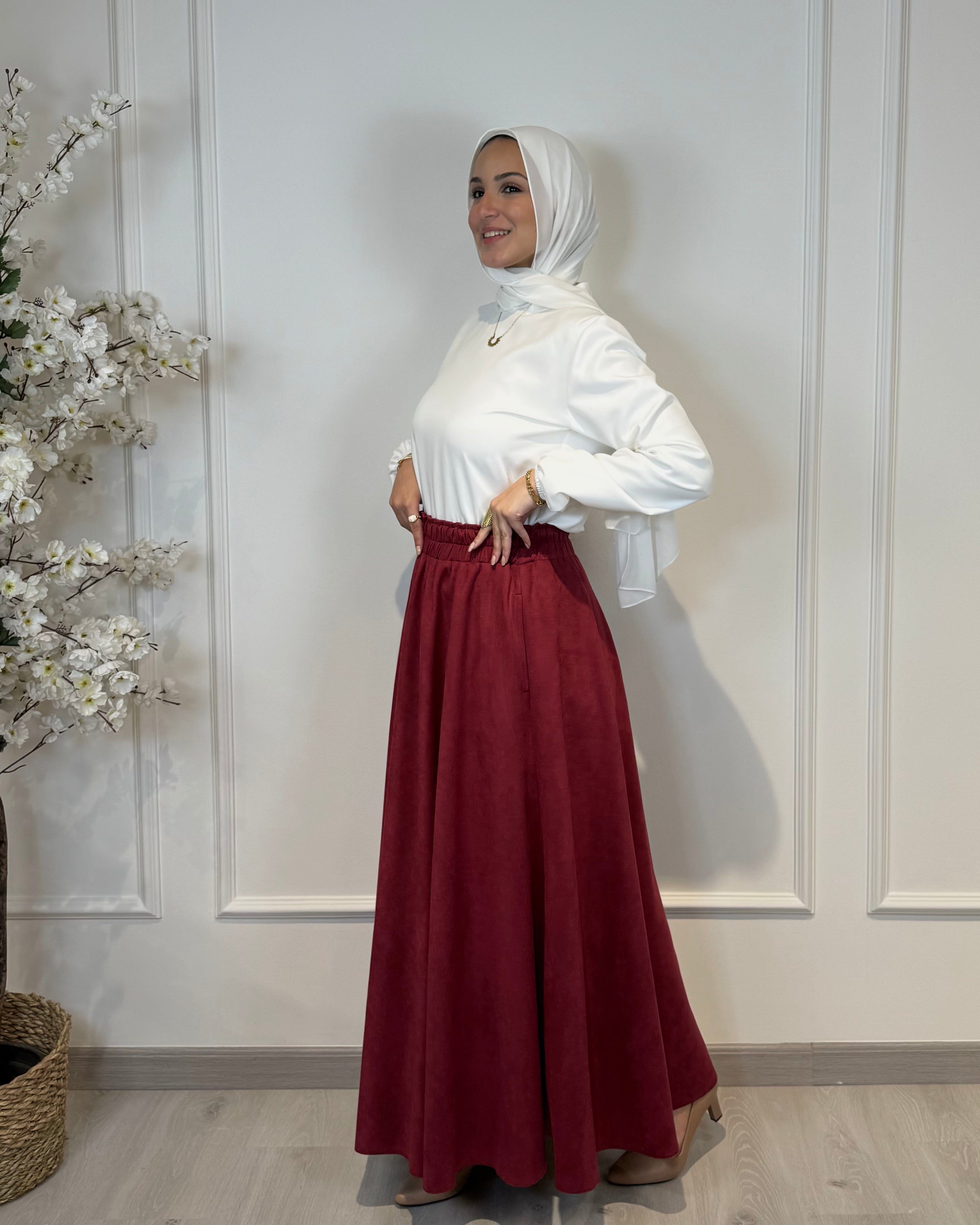 Burgundy full cloche suede skirt with soft texture and elegant modest style