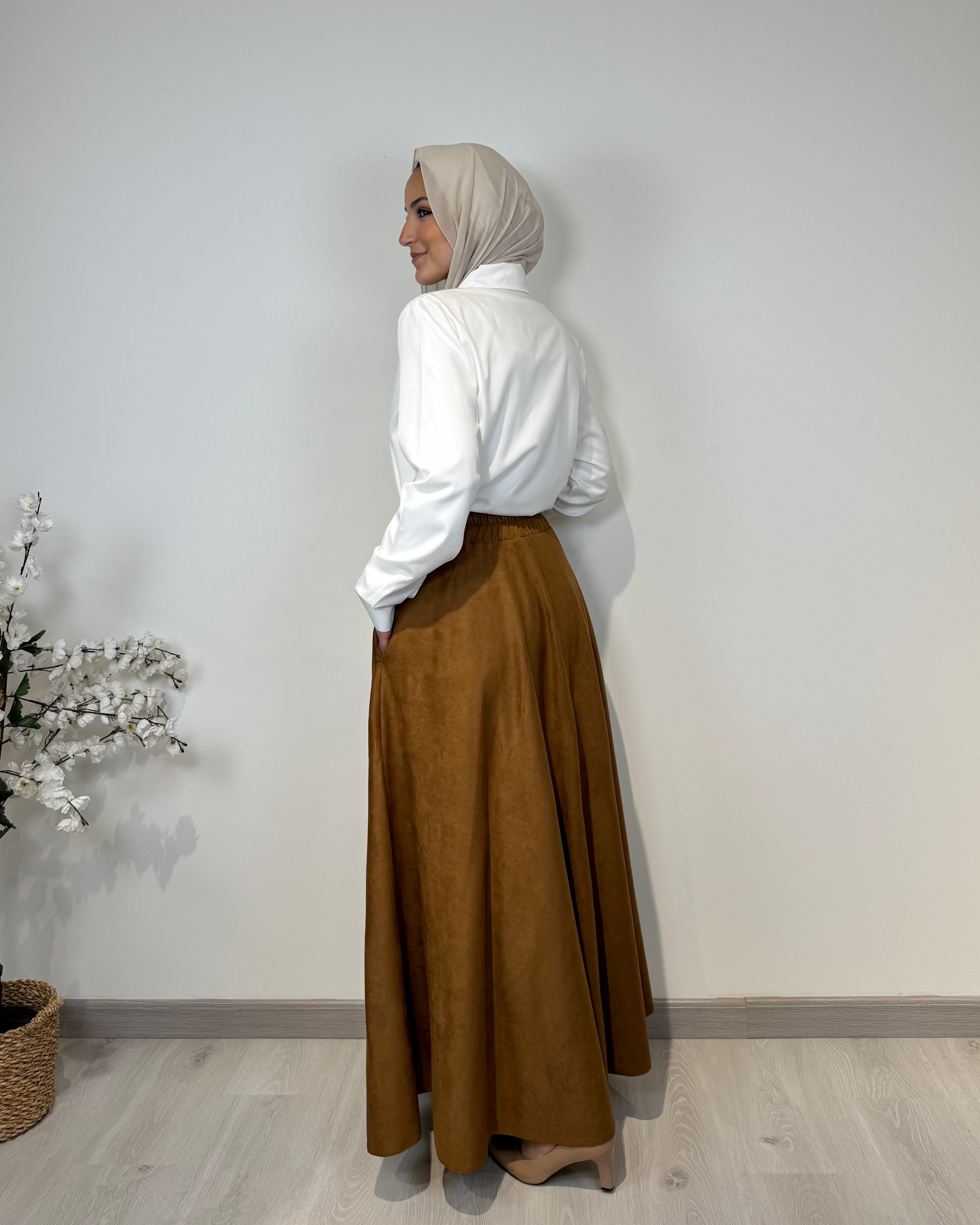 Camel full cloche suede skirt with soft texture and elegant modest style