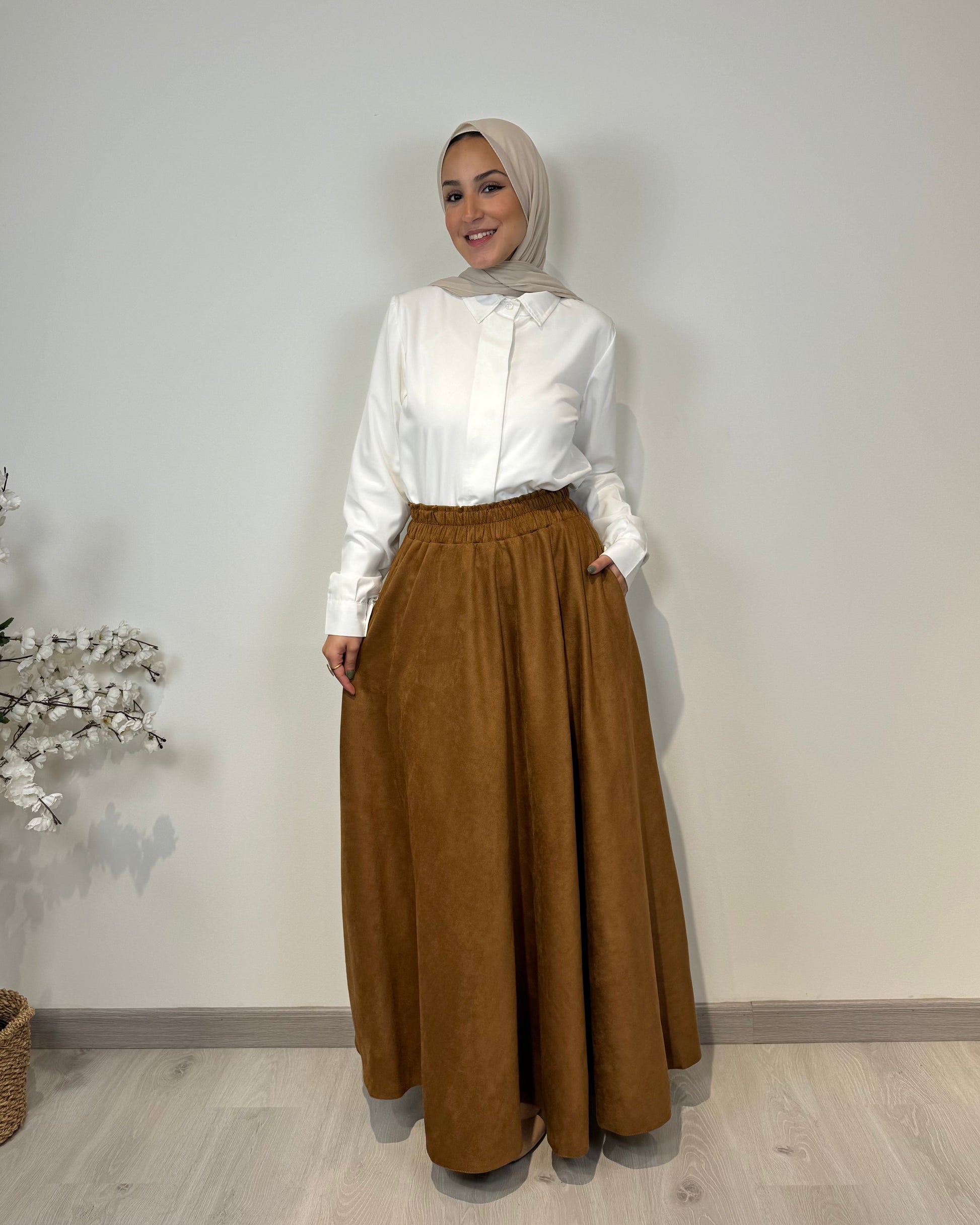 Camel full cloche suede skirt with soft texture and elegant modest style