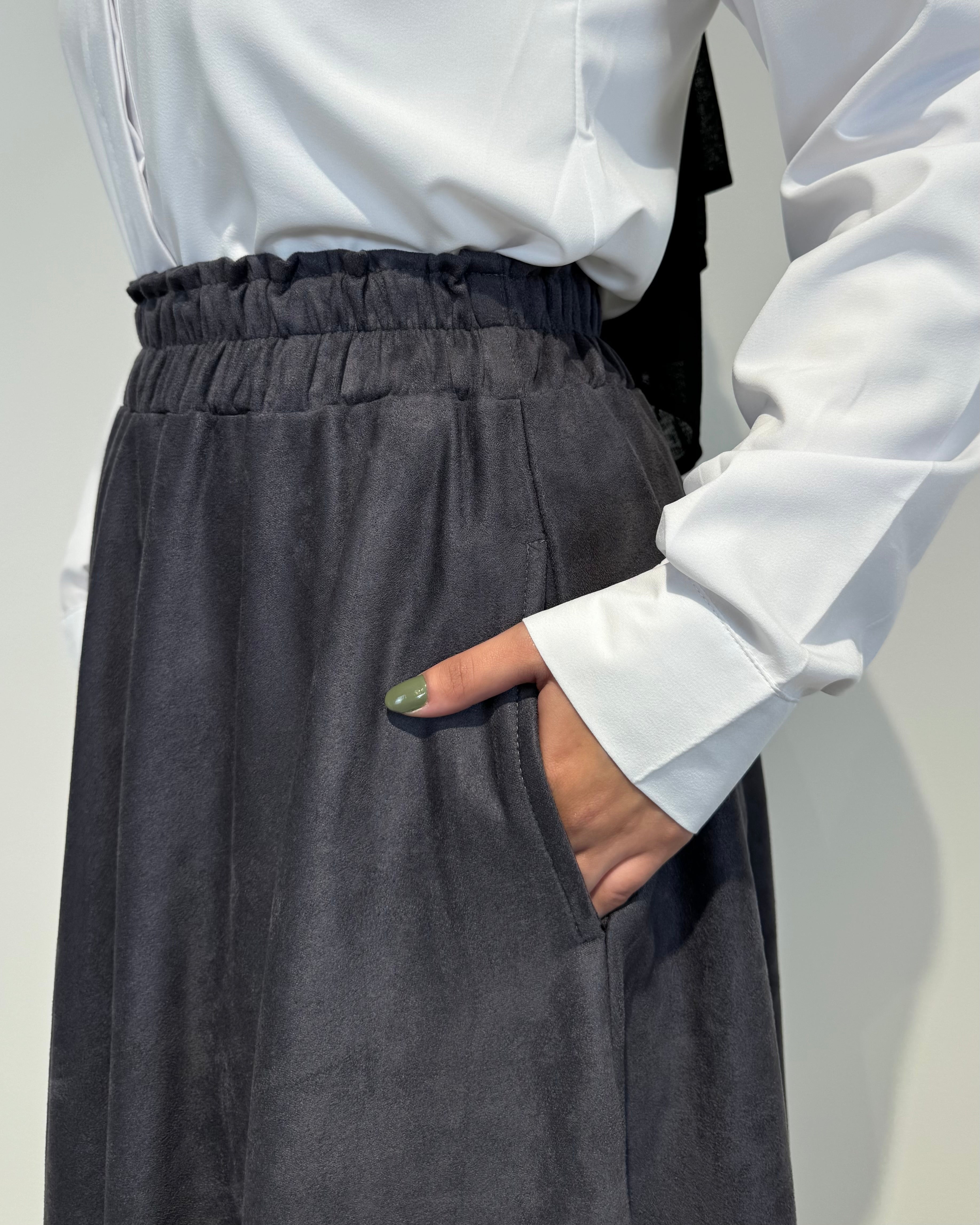 Dark grey full cloche suede skirt with soft texture and elegant modest style