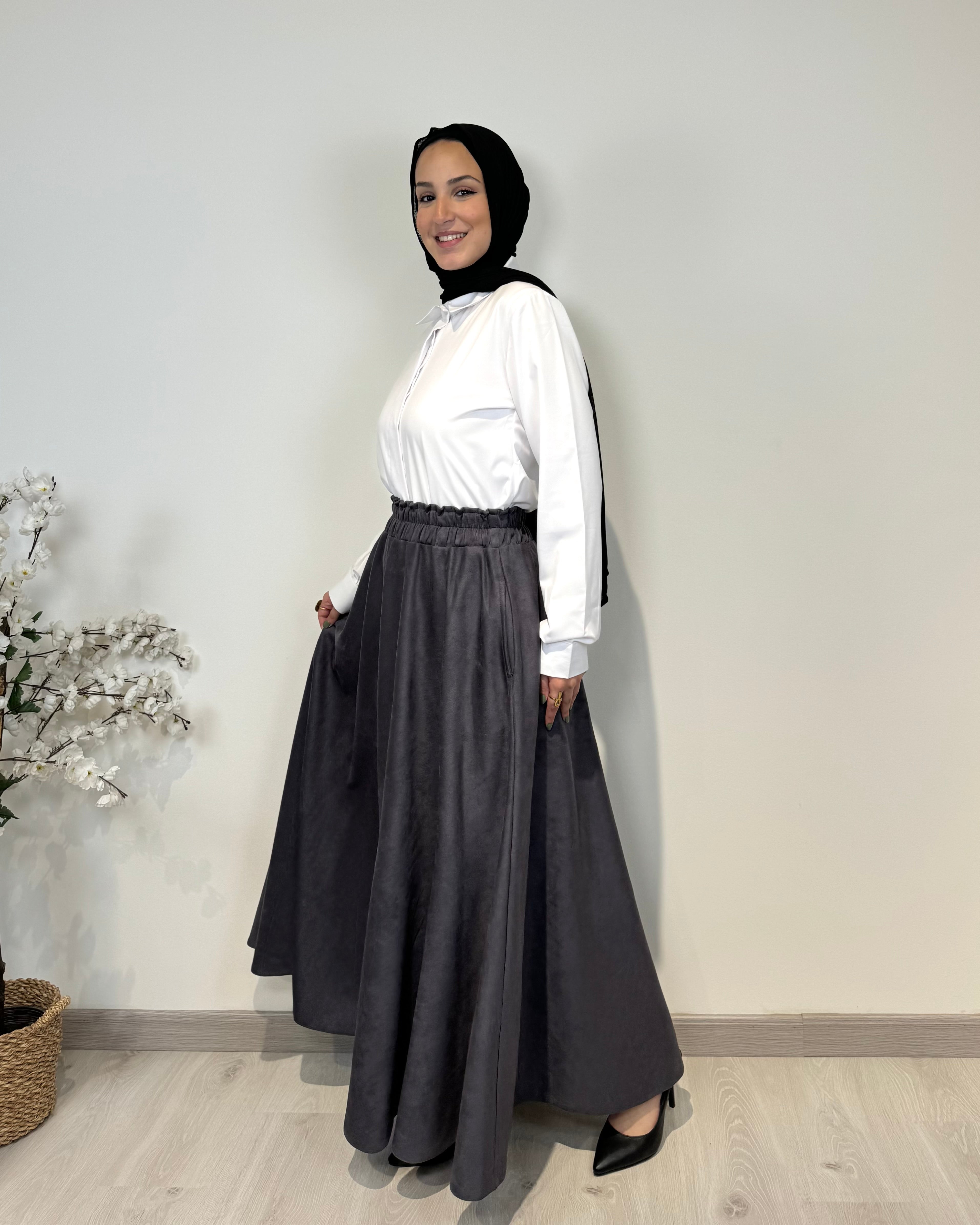 Dark grey full cloche suede skirt with soft texture and elegant modest style