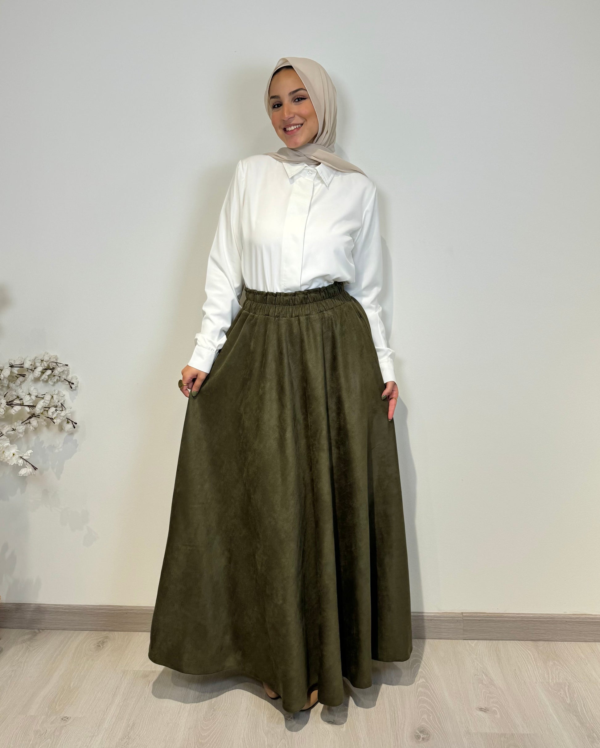 Olive full cloche suede skirt with soft texture and elegant modest style