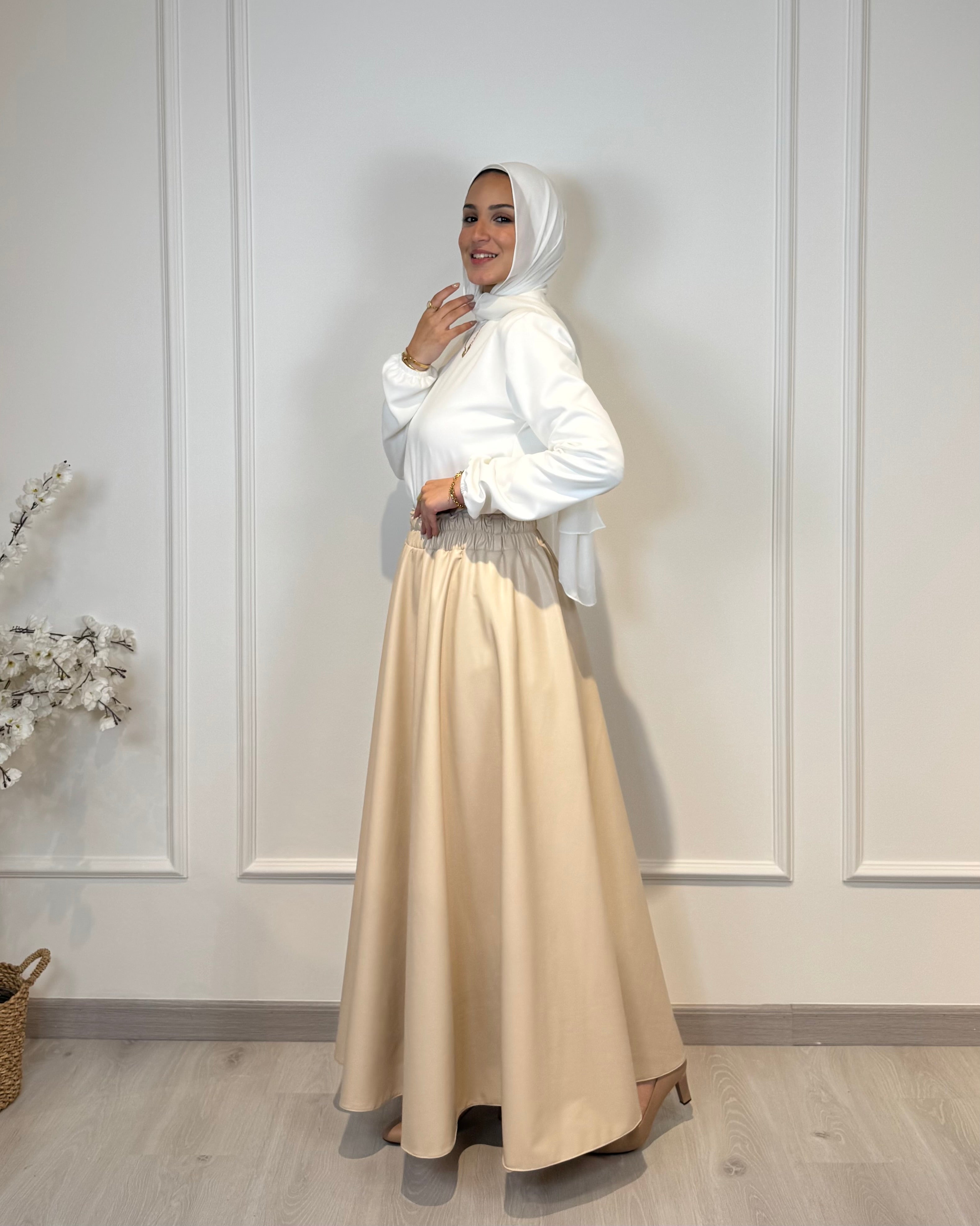 Full cloche leather skirt with high waist and soft inner lining, beige color, modest elegant fit