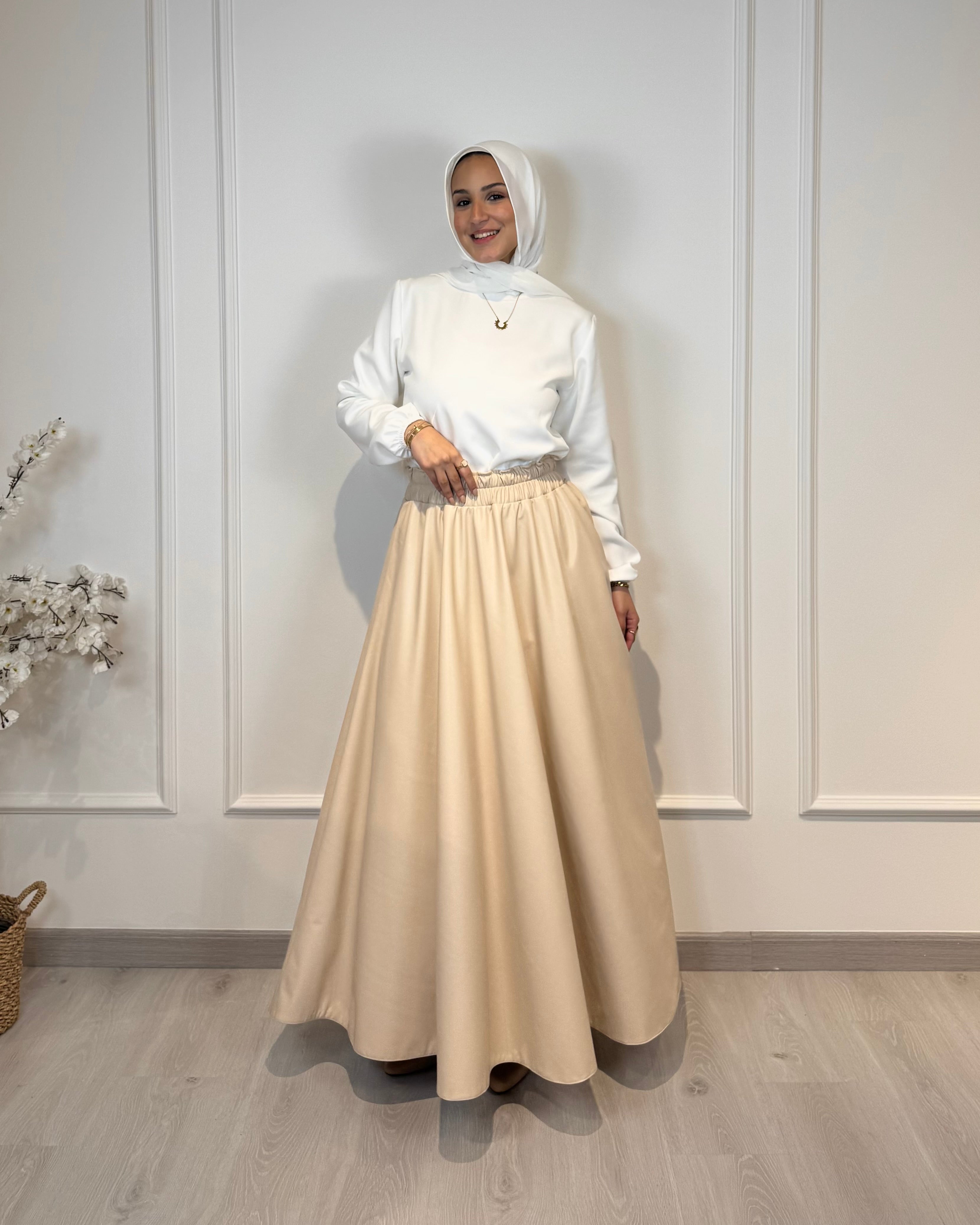 Full cloche leather skirt with high waist and soft inner lining, beige color, modest elegant fit