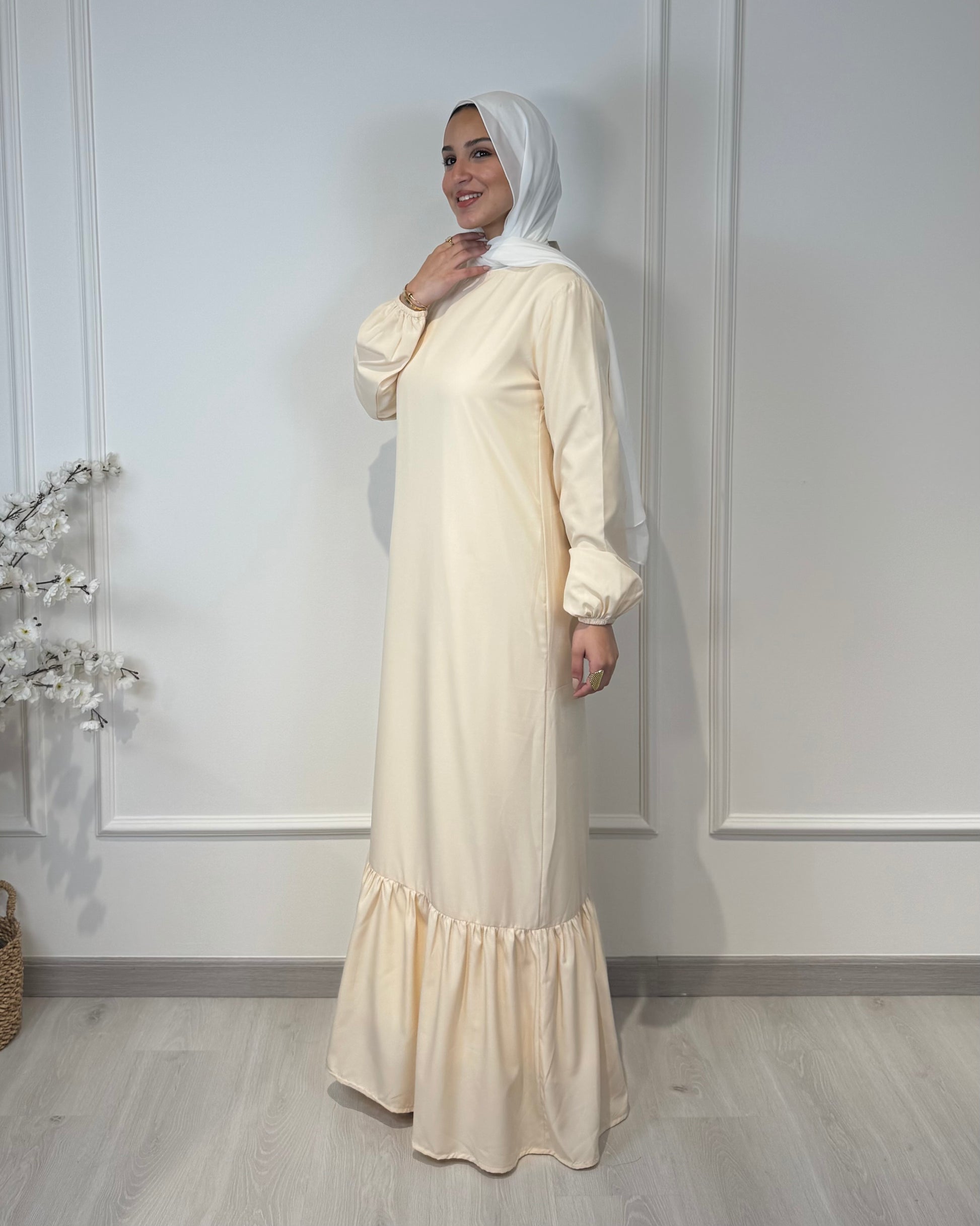 Soft maxi layering dress with ruffle hem and long sleeves, modest loose fit, lightweight fabric, suitable for layering or wearing alone