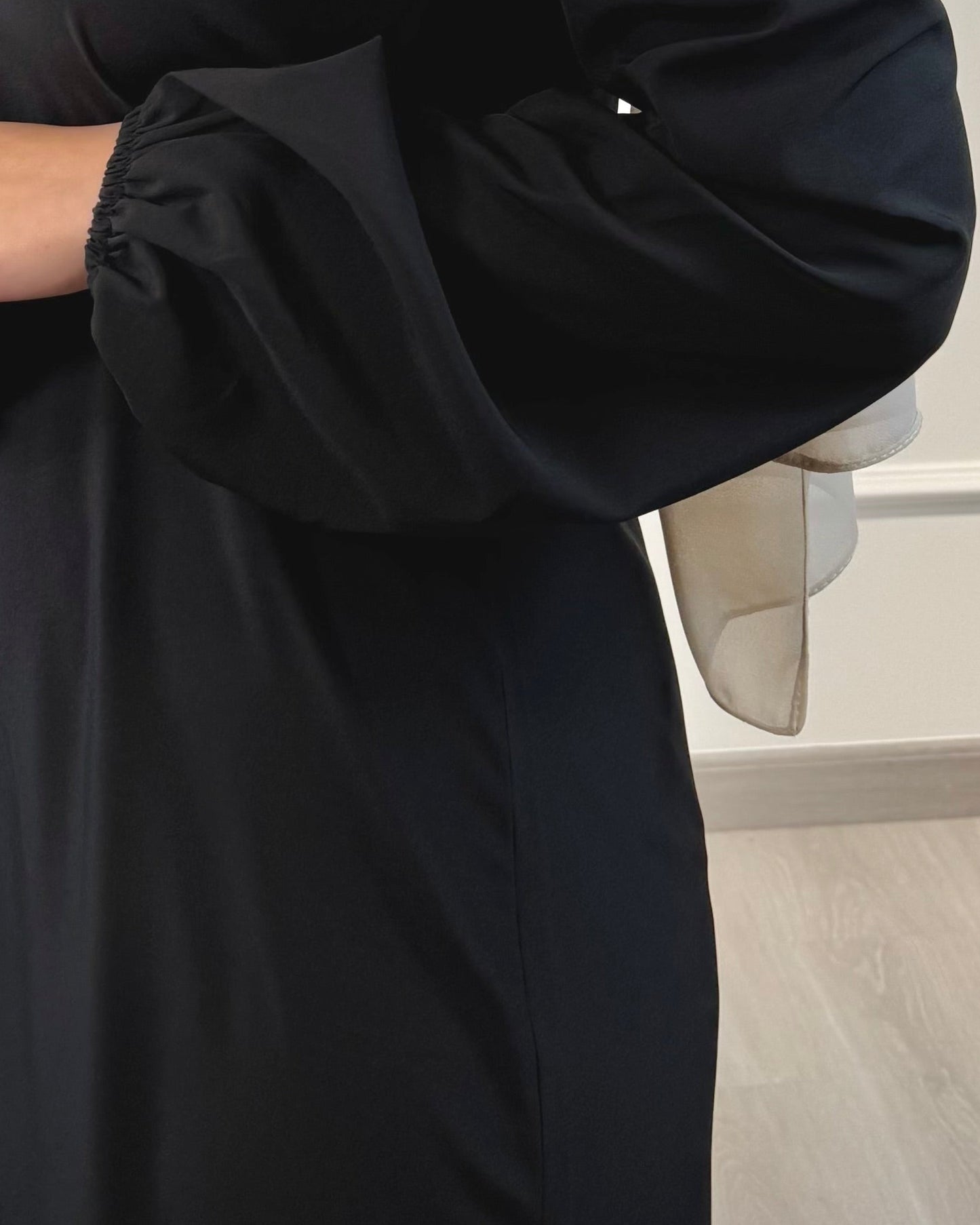 Soft maxi layering dress with ruffle hem and long sleeves, modest loose fit, lightweight fabric, suitable for layering or wearing alone