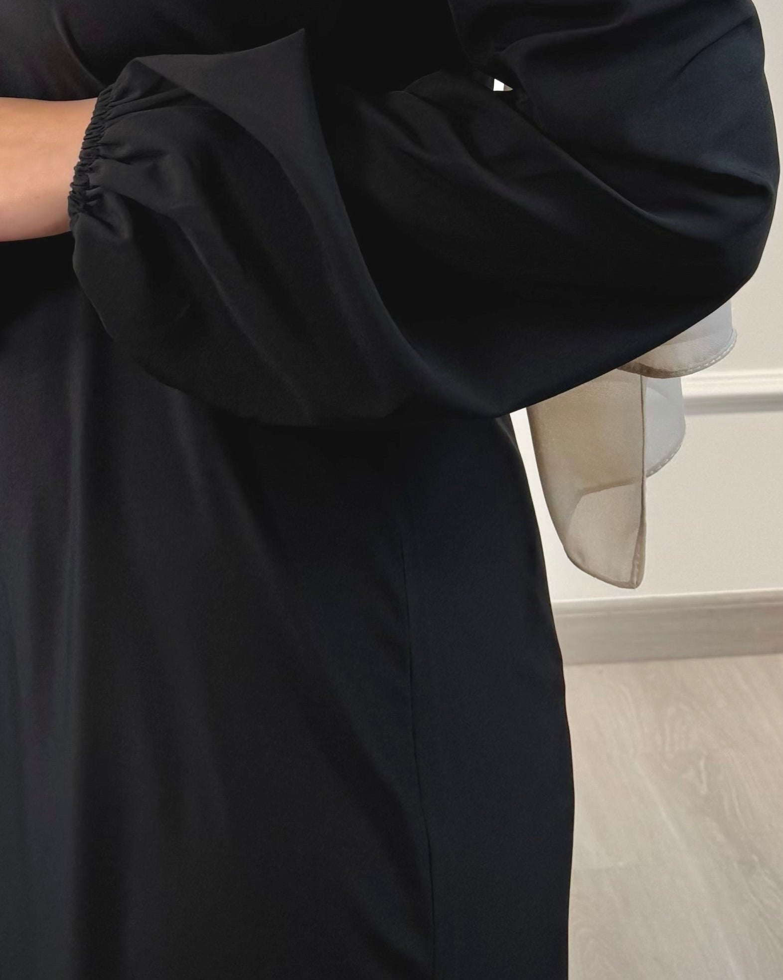 Soft maxi layering dress with ruffle hem and long sleeves, modest loose fit, lightweight fabric, suitable for layering or wearing alone