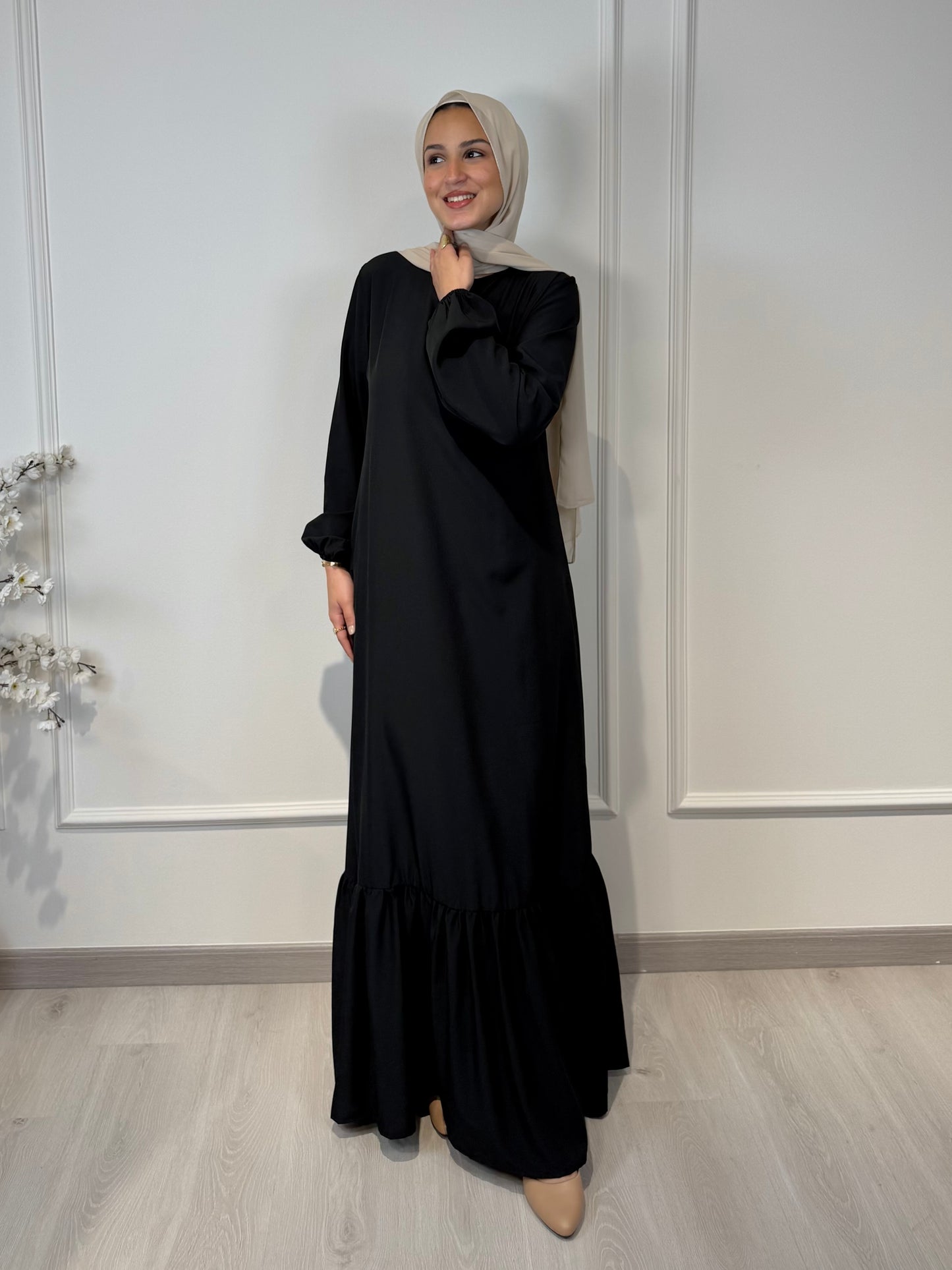 Soft maxi layering dress with ruffle hem and long sleeves, modest loose fit, lightweight fabric, suitable for layering or wearing alone