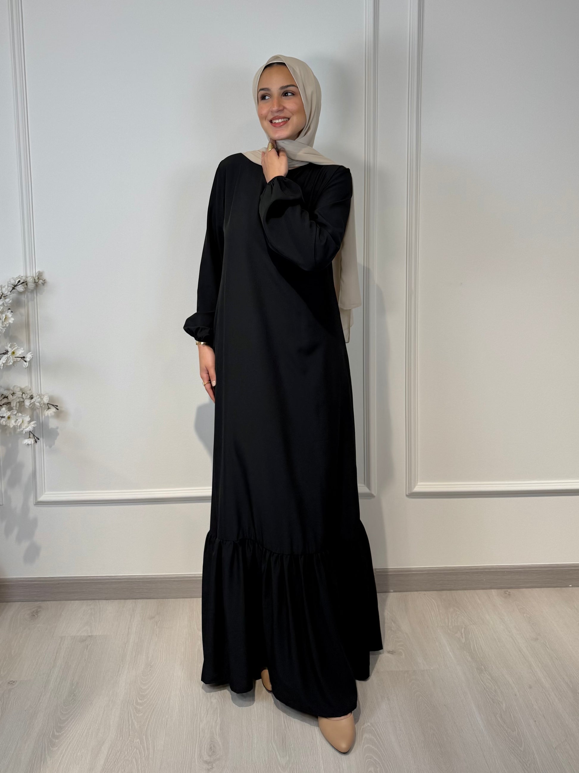 Soft maxi layering dress with ruffle hem and long sleeves, modest loose fit, lightweight fabric, suitable for layering or wearing alone