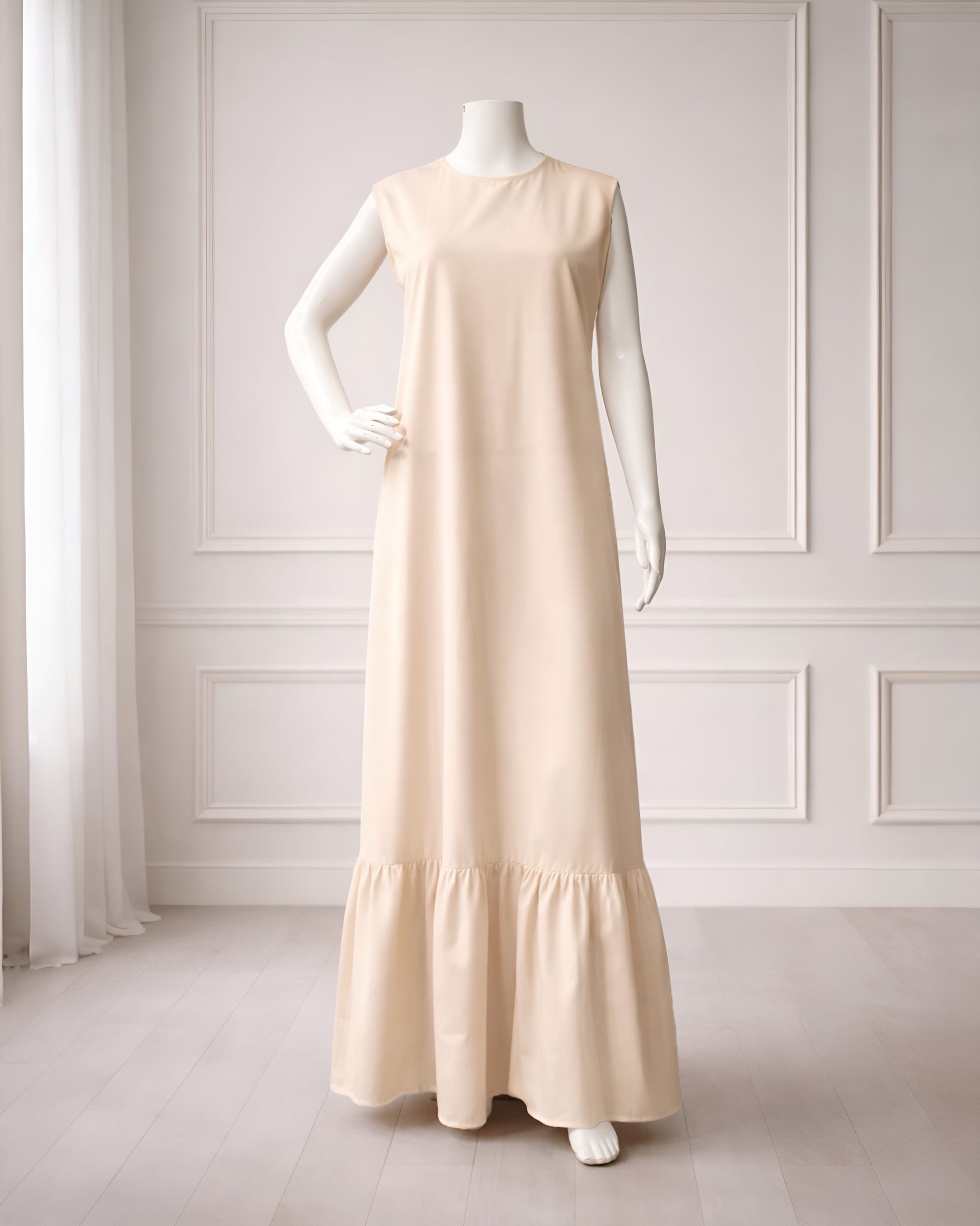 Soft maxi layering dress with ruffle hem and sleeveless, modest loose fit, lightweight fabric, suitable for layering or wearing alone