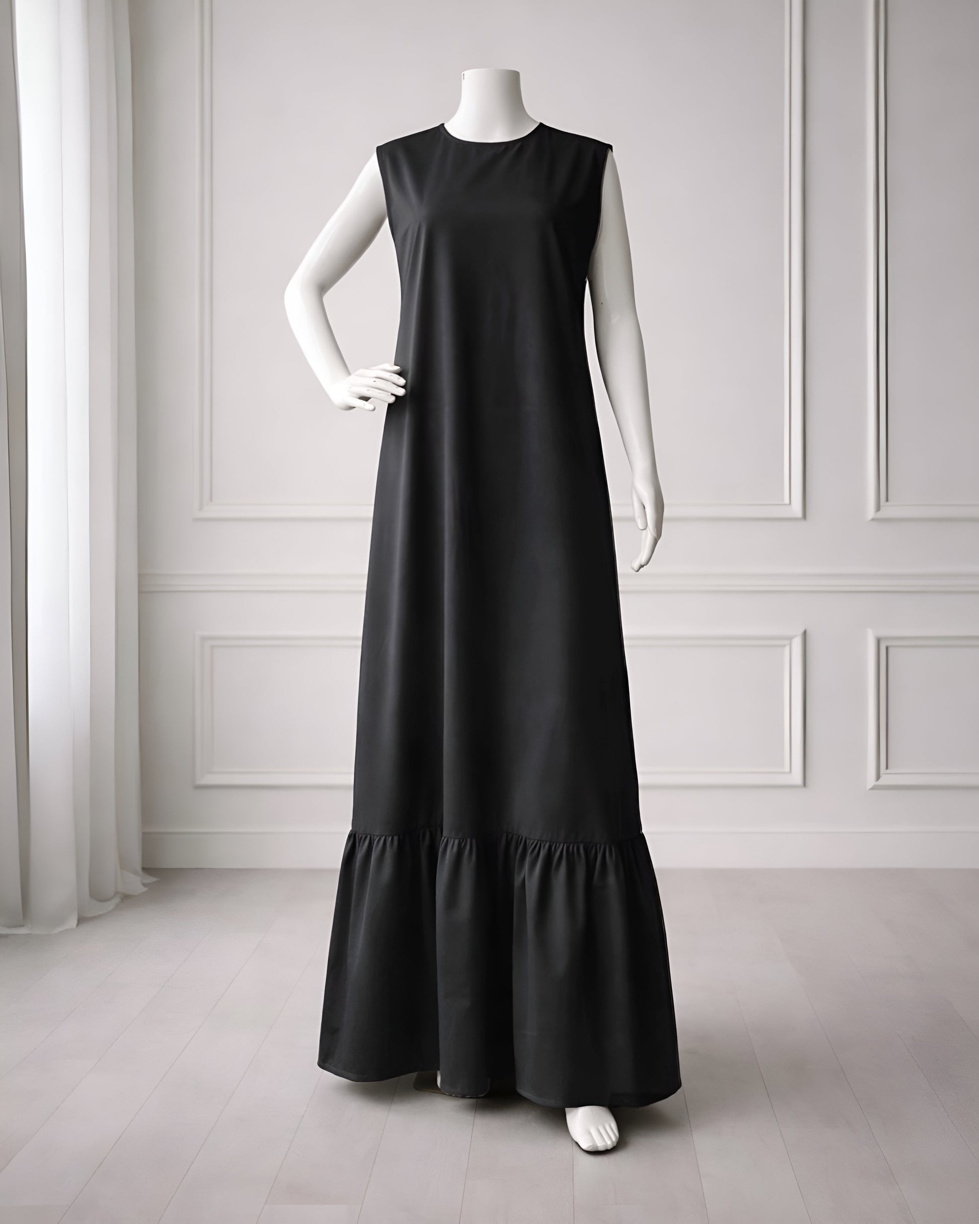 Soft maxi layering dress with ruffle hem and sleeveless, modest loose fit, lightweight fabric, suitable for layering or wearing alone