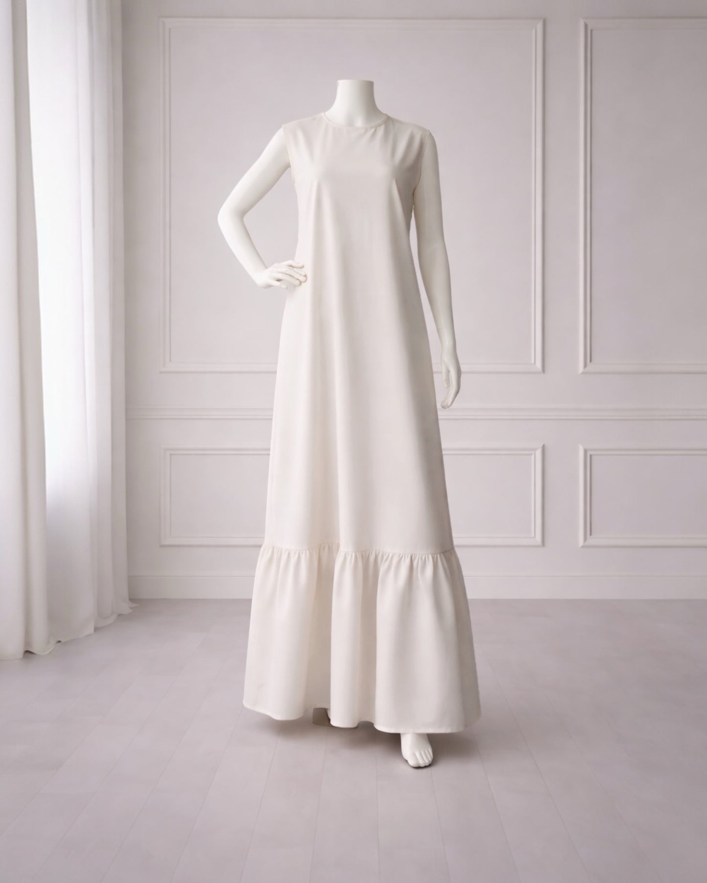 Soft maxi layering dress with ruffle hem and sleeveless, modest loose fit, lightweight fabric, suitable for layering or wearing alone
