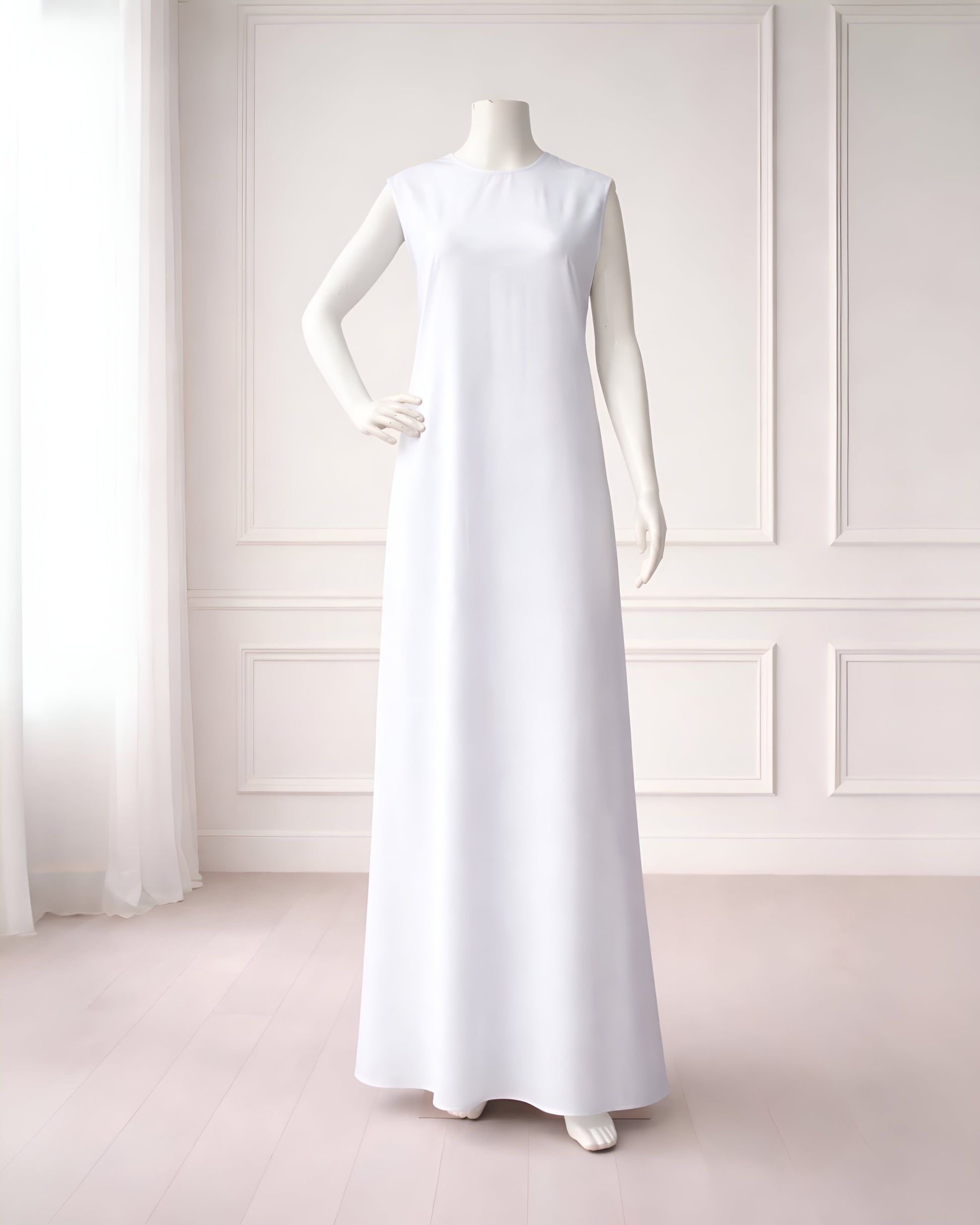 Sleeveless layering maxi dress, perfect for modest outfits. Lightweight and comfortable, ideal for wearing under short or sheer dresses or styling on its own.